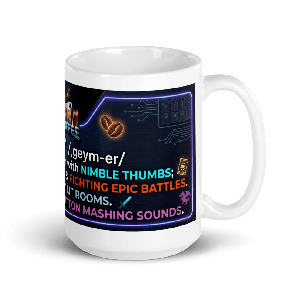 White glossy gamer coffee mug with design featuring gaming terminology and colorful graphics.