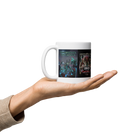 "Hand holding a ceramic Gamer Till the End mug with vivid gaming-themed print, perfect for coffee or tea, microwave and dishwasher safe."